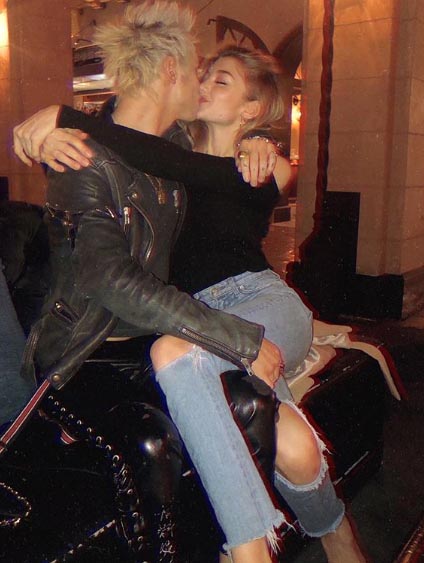 Monica Ollander posting a picture of herself kissing her boyfriend Remington Leith.
